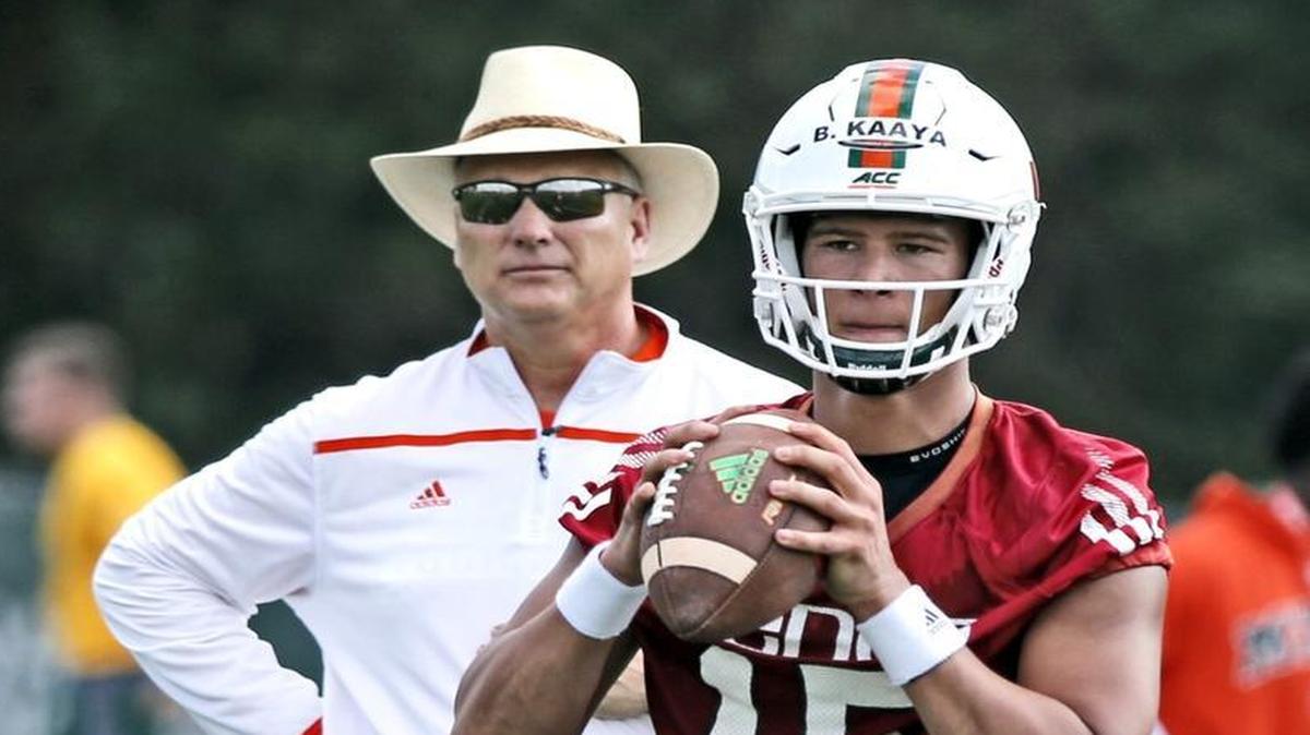 Head Coach Mark Richt next to Hurricanes quarterback Brad Kaaya (15) during opening day of the University of Miami Spring football practice.