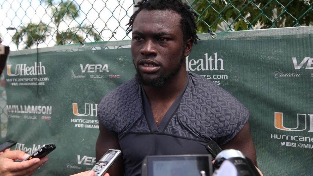 Miami running back Trayone Gray talks to the media following practice last season.