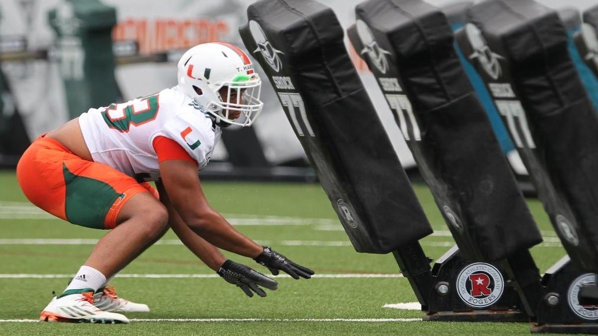 Hurricanes defensive end Trent Harris injured his left hand when it was hit by a helmet, his father confirmed Tuesday.