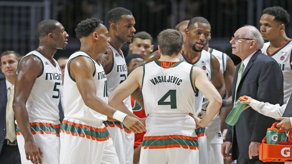 Miami head coach Jim Larranaga with players on the court in the first half as the University of Miami hosts Barry University in a men's basketball at the Watsco Center on Nov. 2, 2016.