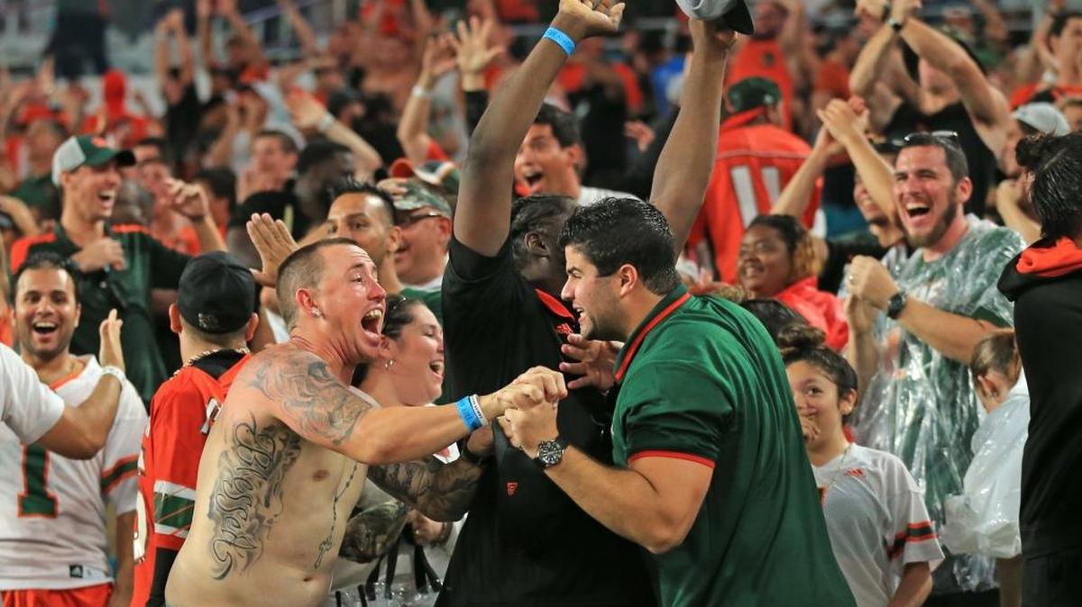 Hurricanes fans react after Michael Badgley in the kicks the winning field goal in the fourth quarter of the University of Miami’s win against Georgia Tech at Hard Rock Stadium on Oct. 14.