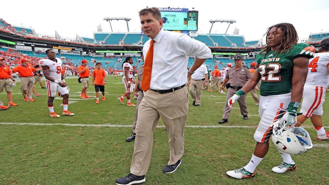University of Miami coach Al Golden walks off the field at Sun Life Stadium on Saturday after the Hurricanes suffered the worst loss in school history.