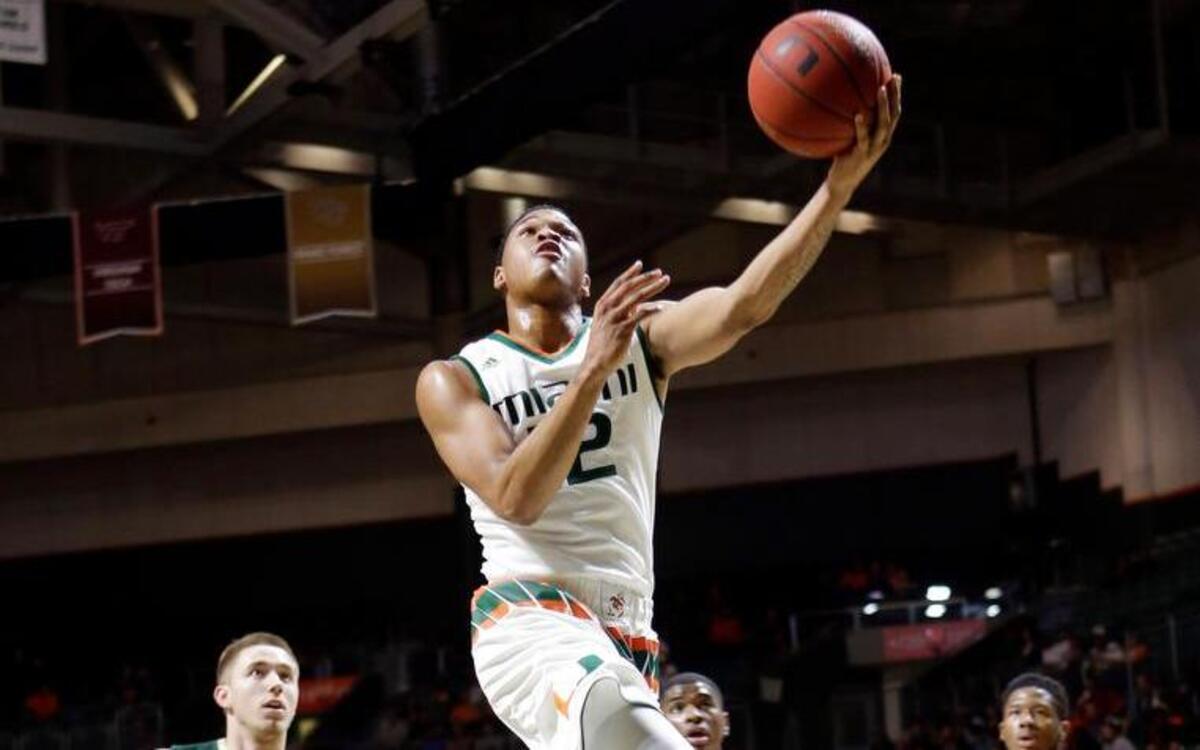 UM guard James Palmer soars to the basket for a layup during Saturday’s 28-point blowout victory over Charlotte at BankUnited Center. Nine Hurricanes scored in the win.