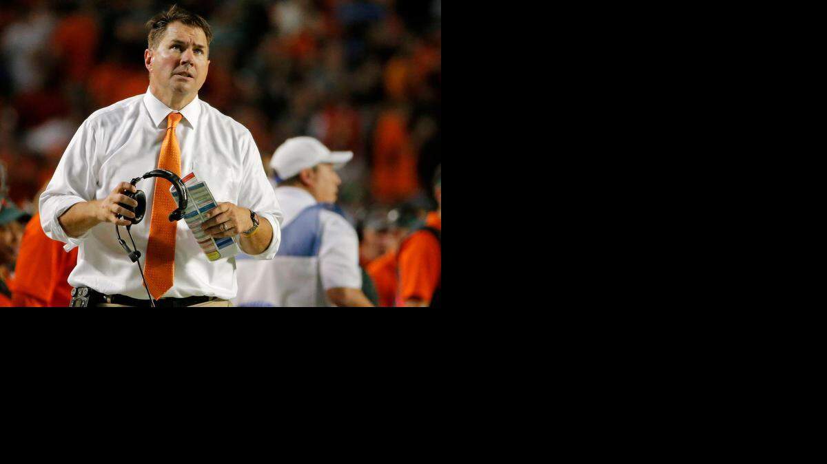 
Miami Hurricanes head coach Al Golden looks on during the third quarter in a game against the Florida State Seminoles at SunLife Stadium in Miami Gardens on Saturday, Nov. 15, 2014.
