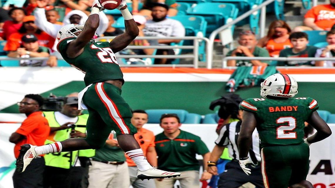 Miami Hurricanes Michael Jackson (28) catches a first quarter interception as they play Syracuse University Saturday, Oct. 21, 2017, at Hard Rock Stadium in Miami Gardens, Fla.