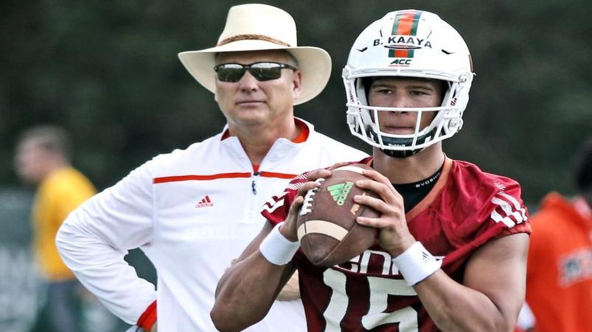 UM coach Mark Richt looks on as quarterback Brad Kaaya prepares to throw during the opening day of spring football practice Tuesday, March 15, 2016 at Greentree Field in Coral Gables.