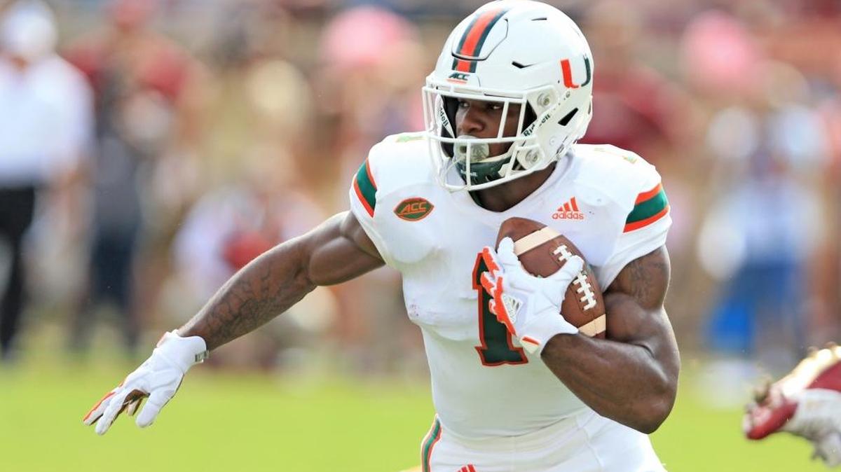 Miami Hurricanes running back Mark Walton (1) runs in the second quarter as the Seminoles host the Miami Hurricanes at Doak Campbell Stadium in Tallahassee on Sat., Oct. 7, 2017.