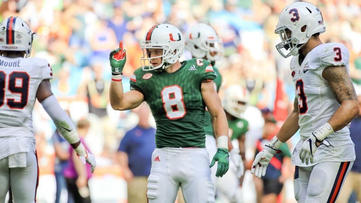 Miami Hurricanes wide receiver Braxton Berrios (8) signals a first down as the University of Miami Hurricanes host the Virginia Cavaliers at Hard Rock Stadium on Sat., Nov. 18, 2017.