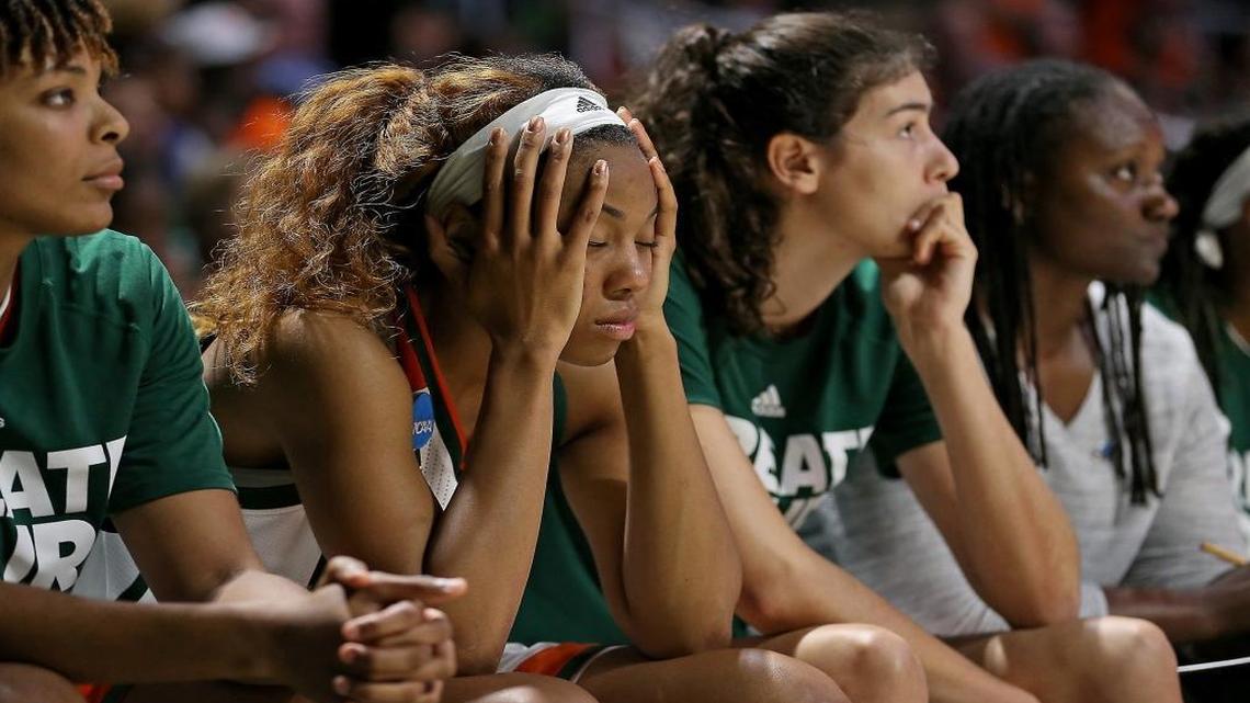 Miami's Erykah Davenport (30) holds her head as the University of Miami women's team loses to Quinnipiac University in the second round of the NCAA Tournament on Mon., March 20, 2017.