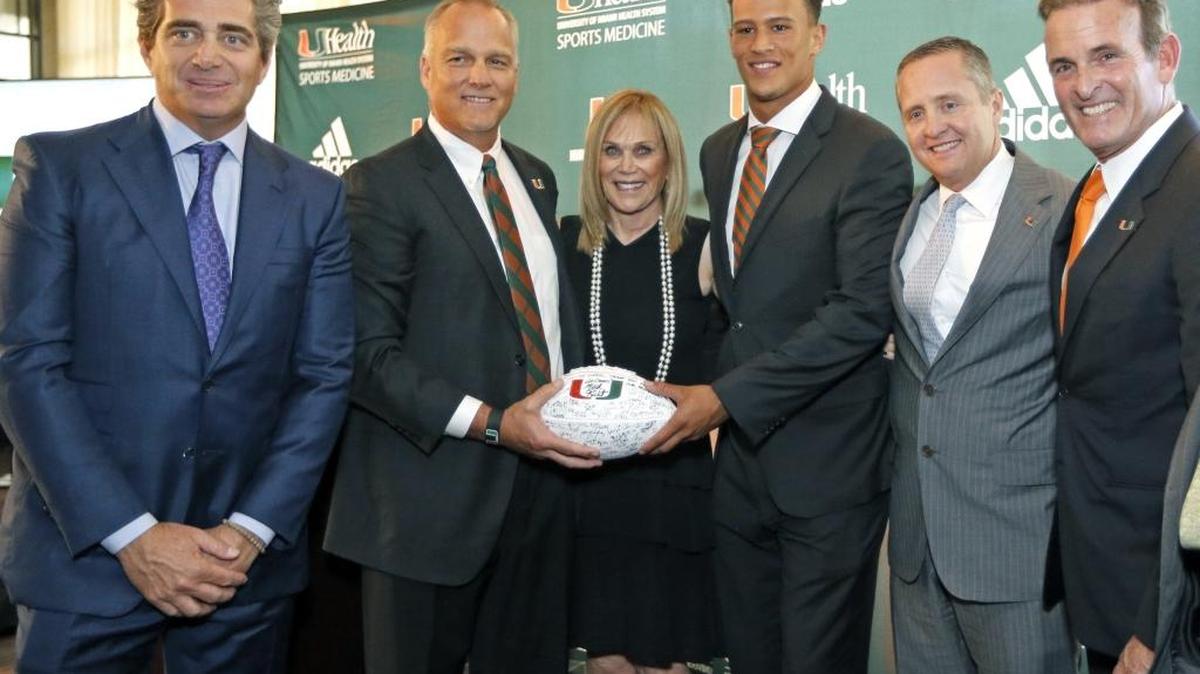 Jeffrey Soffer, University of Miami head coach Mark Richt, Carol Soffer, former quarterback Brad Kaaya, Athletic Director Blake James and Stuart Miller, left to right, as the University of Miami announced on Sept. 23, 2016, the largest donation in the history of the athletics department for the Carol Soffer Football Indoor Practice Facility.
