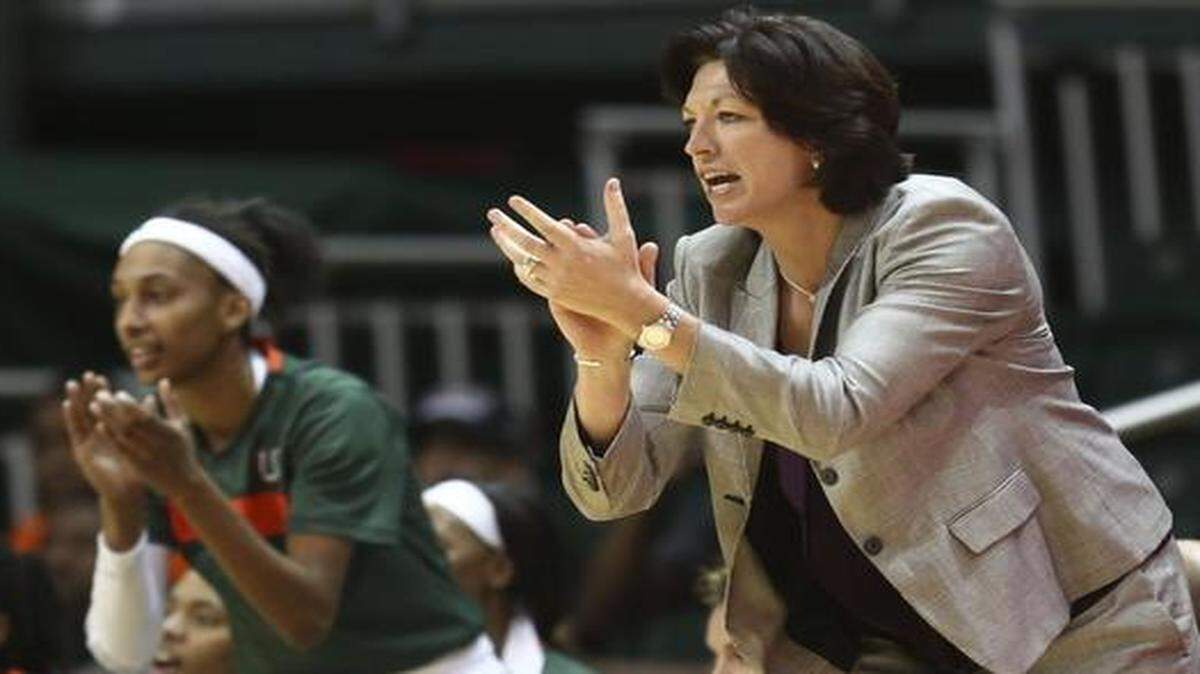
In this Feb. 13, 2014 file photo, UM coach Katie Meier yells instructions to her team during a game against Maryland in Coral Gables, Fla. 

