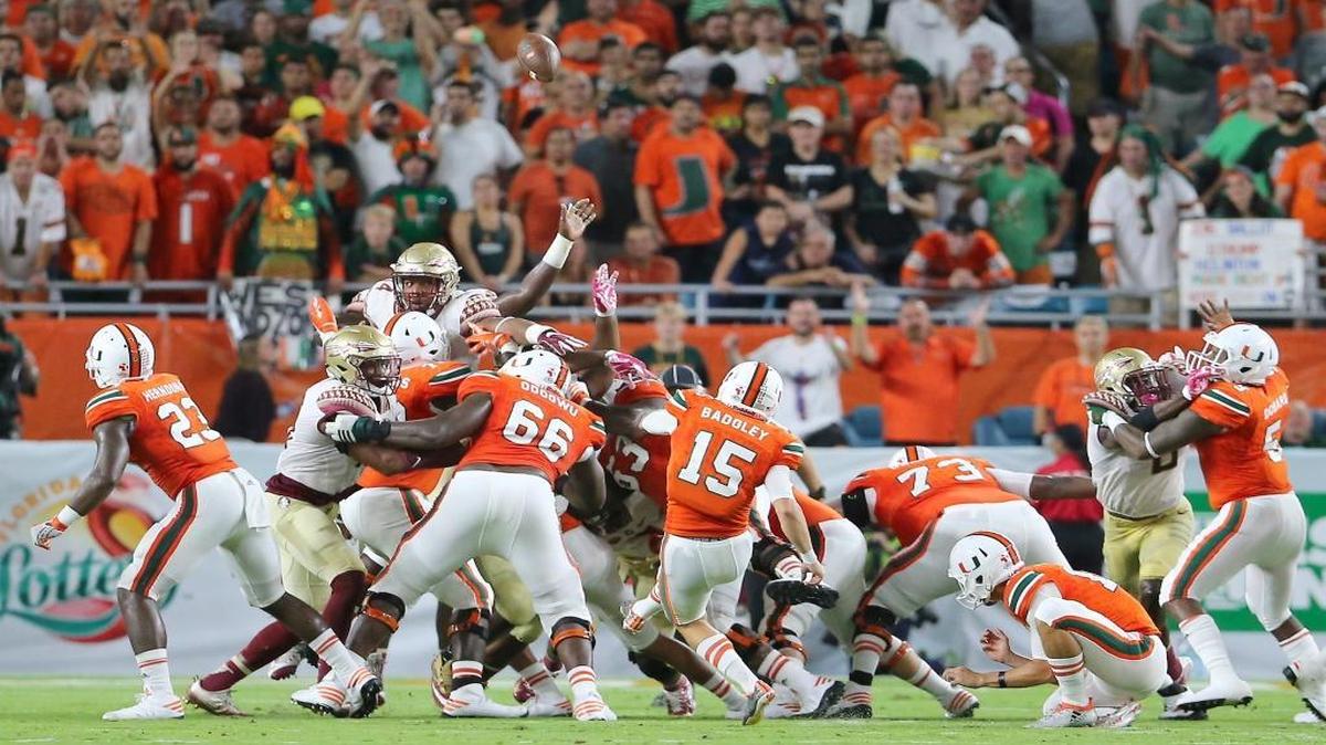 UM kicker Michael Badgley drills a 37-yard field goal in the first quarter of Saturday night’s showdown. He added a 51-yarder in the second quarter.