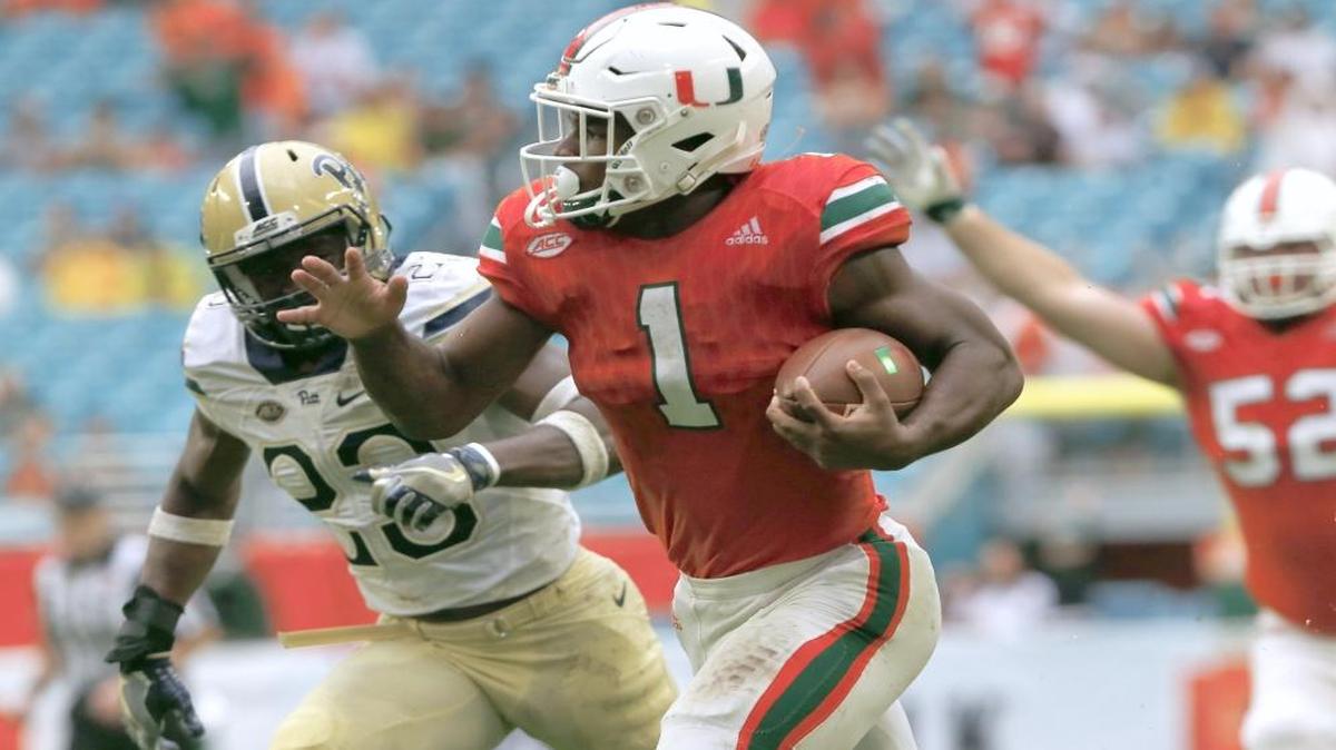 Miami Hurricanes running back Mark Walton (1) runs for a 55 yard touchdown in the fourth quarter as the University of Miami hosts Pittsburgh at Hard Rock Stadium on Sat., Nov. 5, 2016.