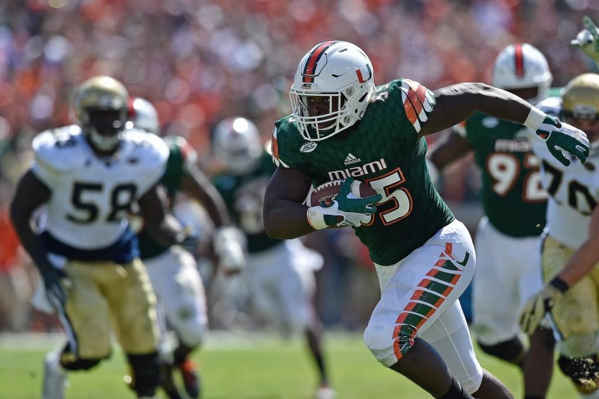 Miami linebacker Shaquille Quarterman, shown returning a fumble for a touchdown at Georgia Tech in 2016, will be part of a UM defense that tries once again to stop the triple-option offense on Saturday in Atlanta.