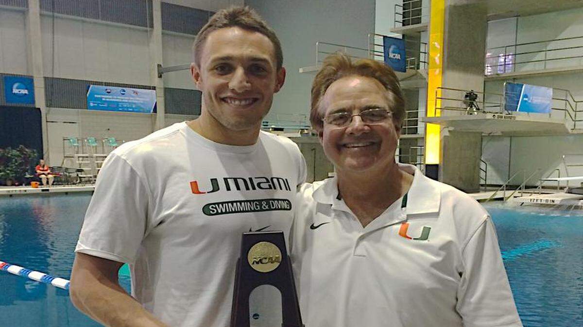 
NCAA champion diver Sam Dorman, left, is shown with Hurricanes coach Randy Ableman.
