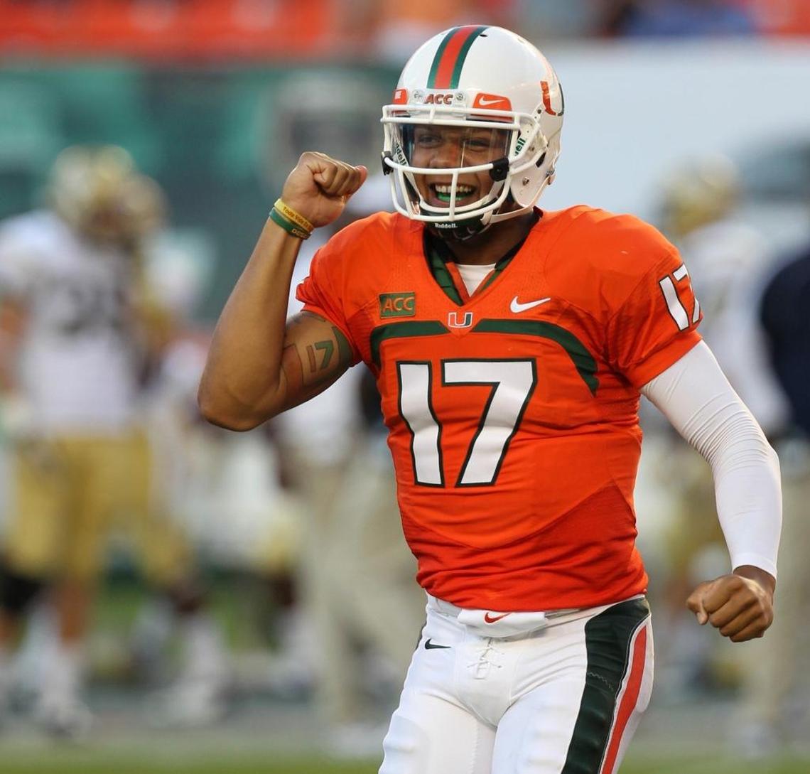 Miami quarterback Stephen Morris celebrates after a late fourth quarter touchdown run by Dallas Crawford as the University of Miami hosts Georgia Tech at Sun Life Stadium on October 5, 2013.