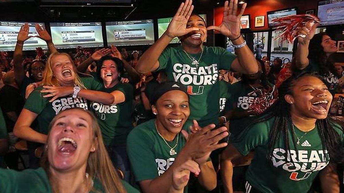 UM women celebrate last Monday upon finding out they are hosting NCAA Tournament first and second-round games.