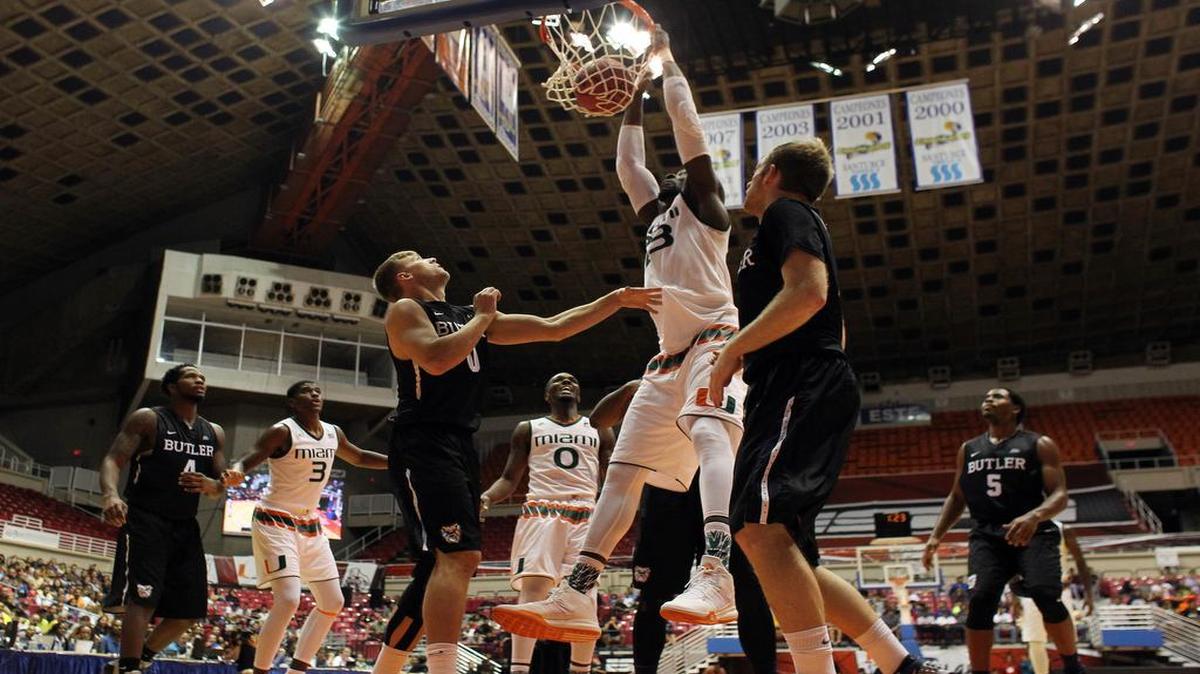 Miami center Tonye Jekiri, center, slams dunk the ball during the Puerto Rico Tip-Off college basketball tournament against Butler in San Juan, Sunday, Nov. 22, 2015.
