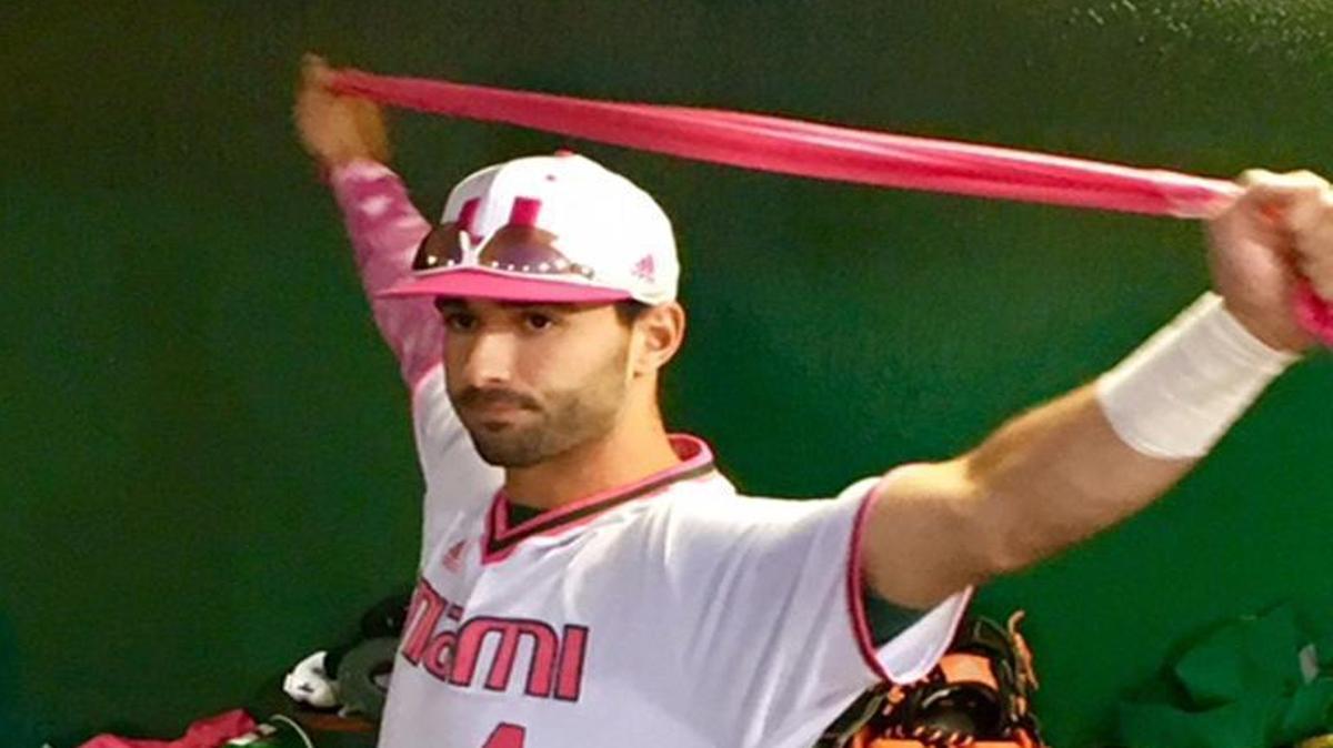 University of Miami second baseman Johnny Ruiz stretches Friday, March 10, 2017, before the ACC opener against Georgia Tech. The Hurricanes wore pink and white uniforms for breast cancer awareness. Ruiz drove in the first run for Miami, which went on to win 10-8.