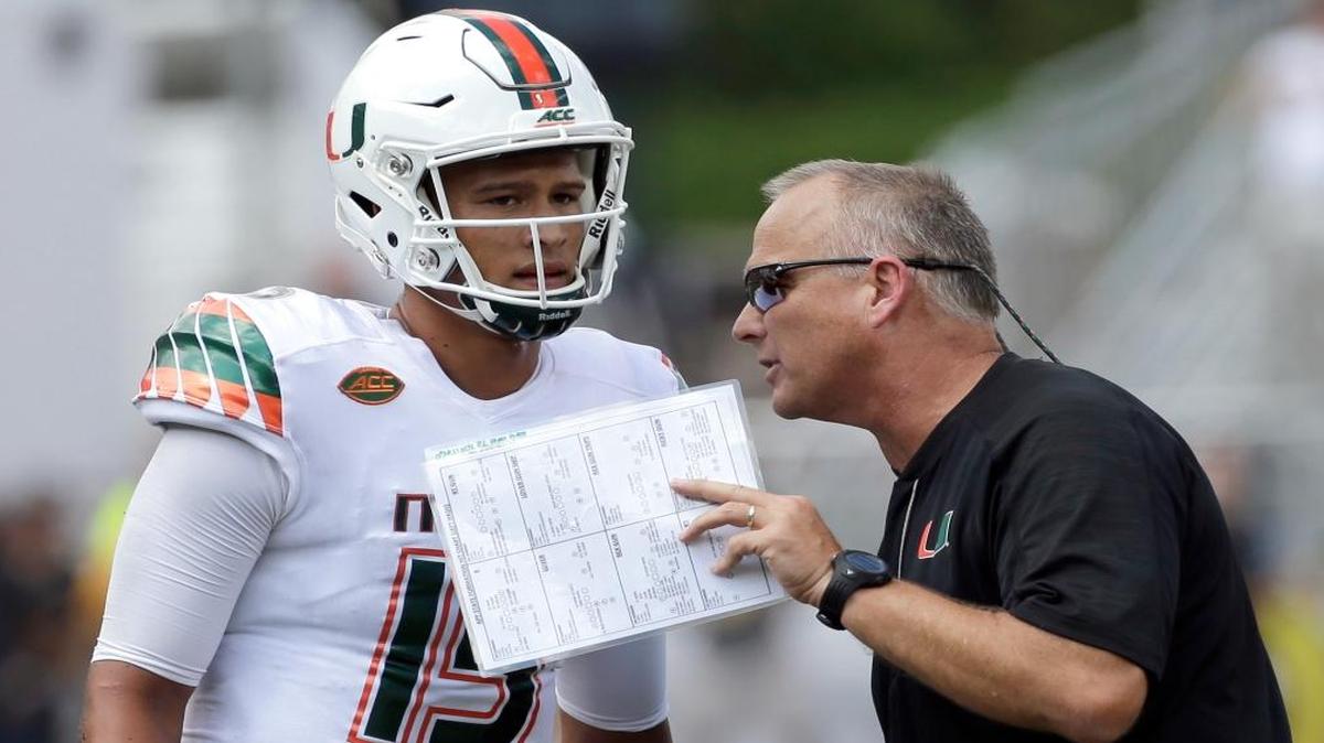 Miami head coach Mark Richt, right, talks with quarterback Brad Kaaya (15) during the second half of an NCAA college football game against Appalachian State in Boone, N.C., Sat., Sept. 17, 2016.