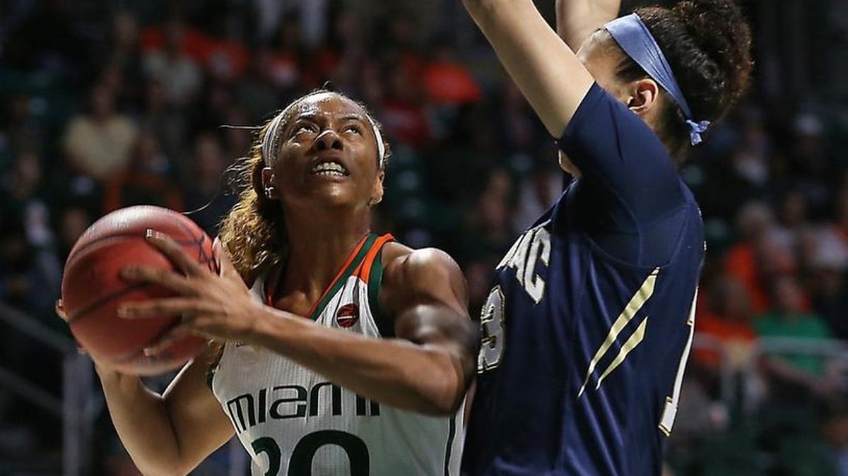 Miami's Erykah Davenport, left, drives past Quinnipiac's Sarah Shewan as the University of Miami women's team hosts Quinnipiac University in the second round of the NCAA Tournament on Mon., March 20, 2017.