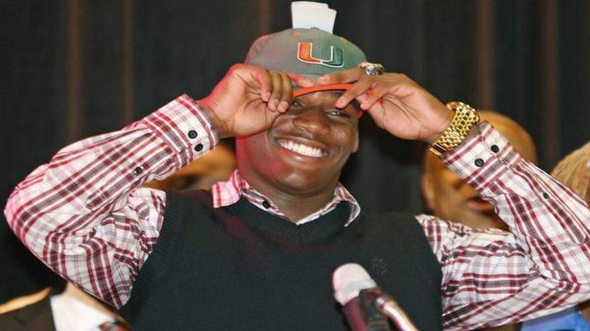 
James King commits to signing with the University of Miami during National Signing Day at Booker T. Washington with on Wednesday, February 4, 2015.
