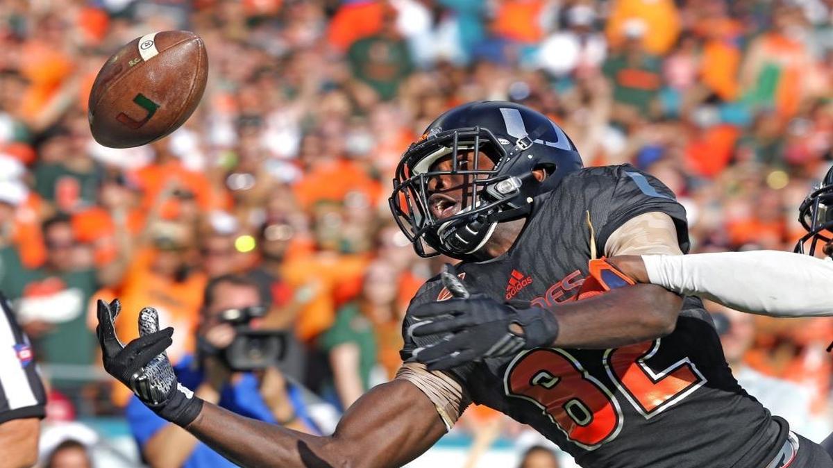 Miami Hurricanes Tyre Brady misses a ball in the endzone at the end of the first quarter as they play the Virginia Cavaliers at Sun Life Stadium in Miami Gardens, Florida, November 7, 2015.