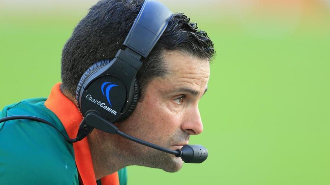 Defensive coordinator Manny Diaz watches the game in the first half as the University of Miami hosts Georgia Tech at Hard Rock Stadium on Saturday, October 14, 2017.