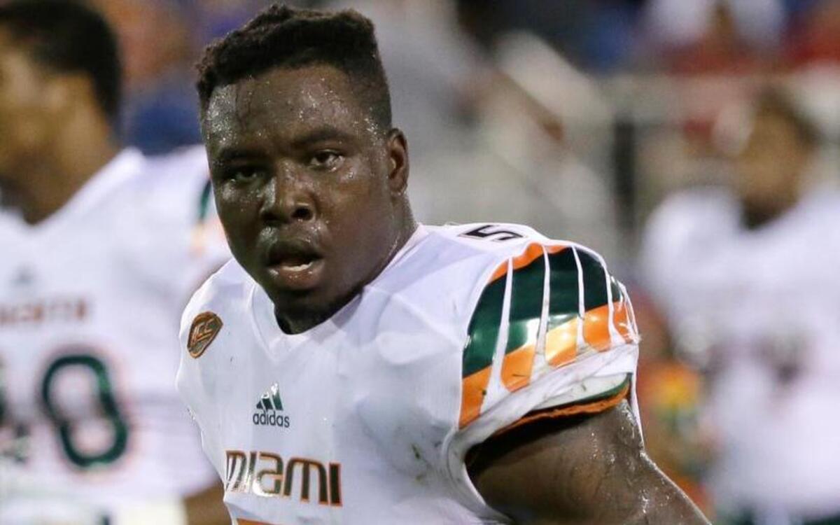 
Miami linebacker Jermaine Grace walks off the field at the end of the first half of an NCAA college football game against Florida Atlantic, Friday, Sept. 11, 2015, in Boca Raton, Fla.
