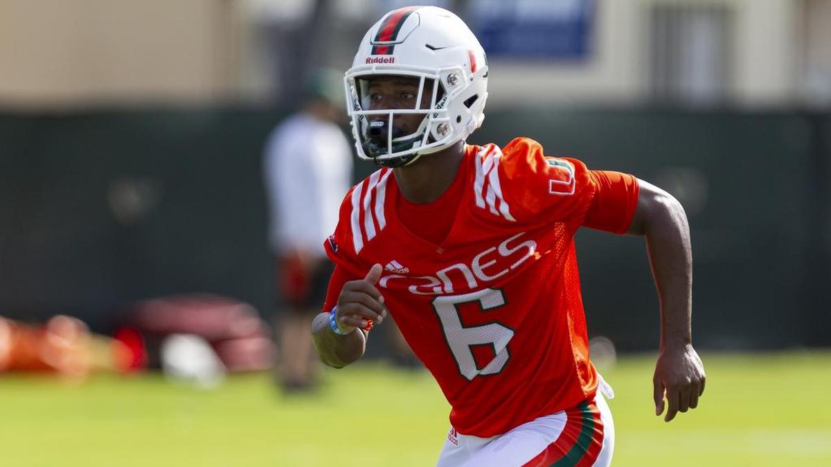 University of Miami freshman wide receiver Mark Pope (6) runs a drill during the first day of fall training camp on Saturday.  Pope has impressed UM people since his arrival in May.