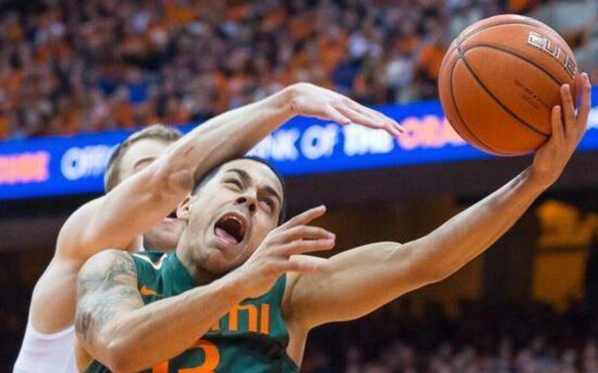 
Angel Rodriguez of UM reacts after being fouled by Trevor Cooney of Syracuse on Jan. 24, 2015 at The Carrier Dome in Syracuse, N.Y. 
