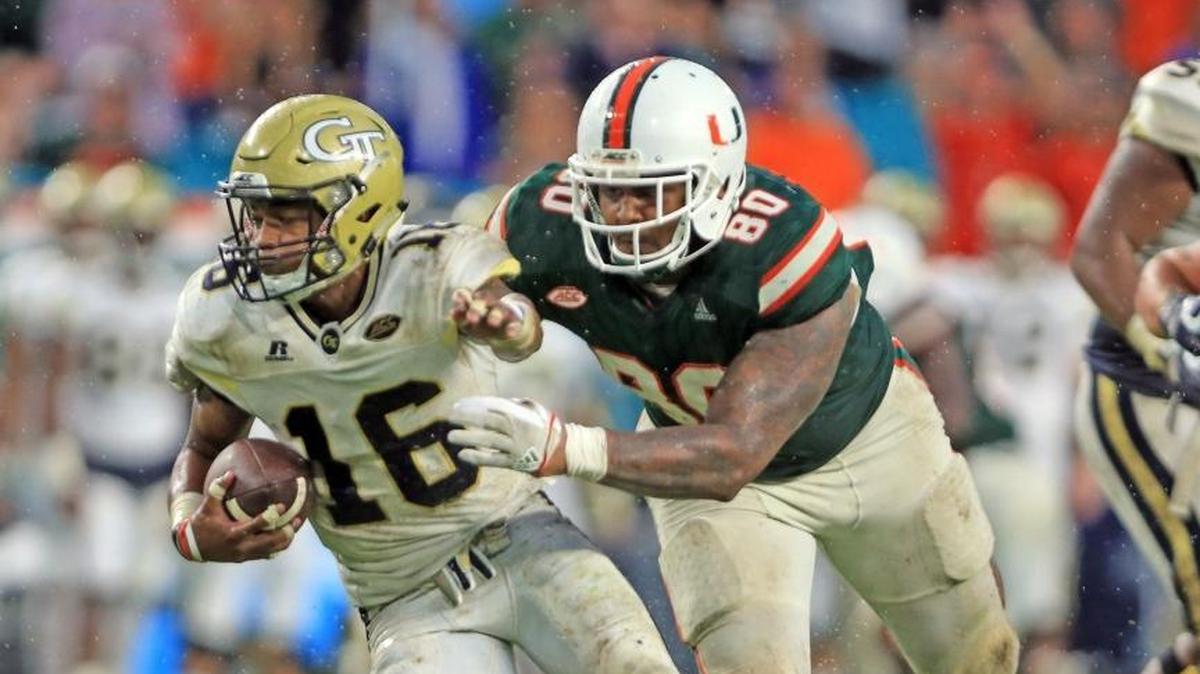 Miami Hurricanes defensive tackle RJ McIntosh chases Georgia Tech Yellow Jackets quarterback TaQuon Marshall late in the fourth quarter in UM’s victory at Hard Rock Stadium on Saturday, October 14, 2017.