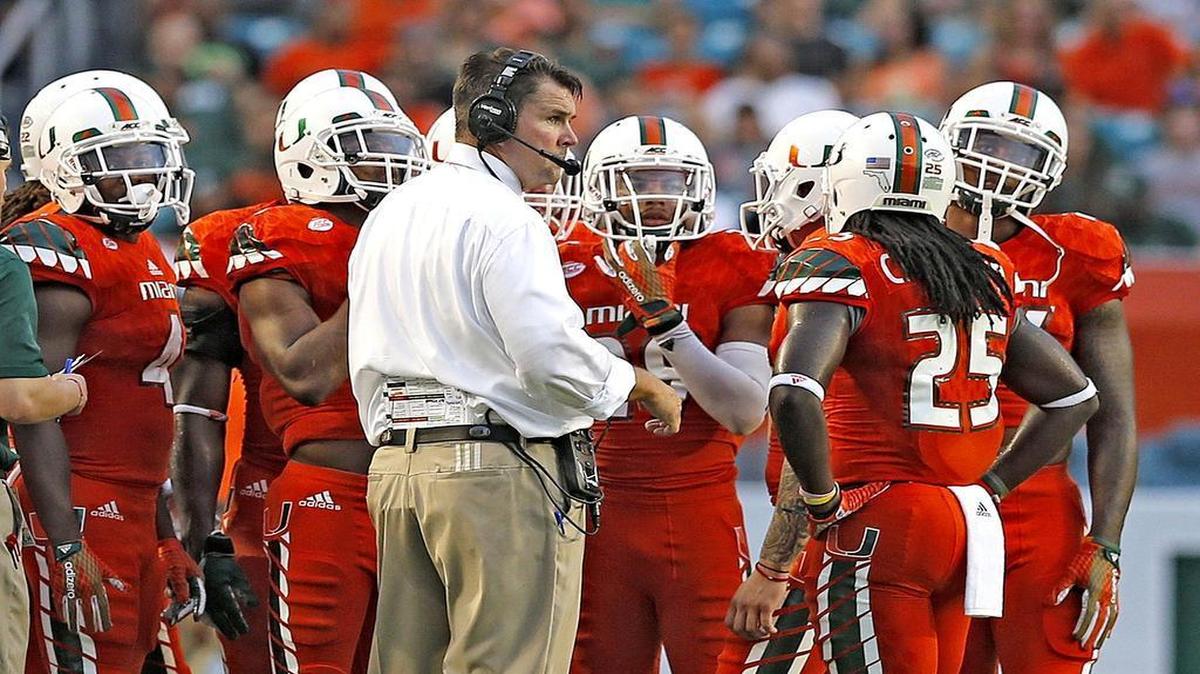 
Head coach Al Golden with players on the field as the University of Miami hosts Bethune-Cookman at Sun Life Stadium on Saturday, September 5, 2015.
