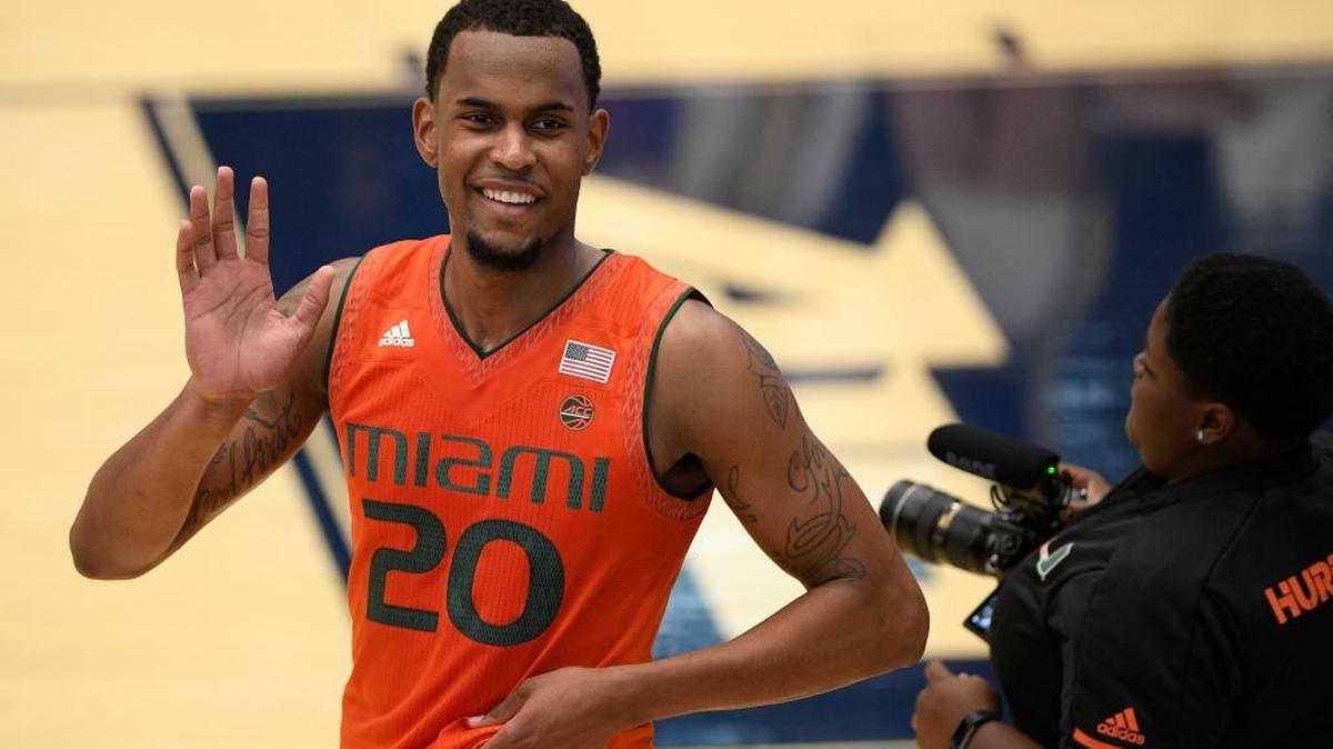 Miami forward Dewan Huell (20) waves to the crowd after an NCAA college basketball game against George Washington on Saturday, Dec. 16, 2017, in Washington. Miami won 59-50.