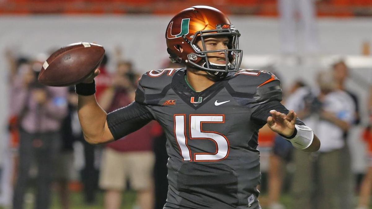 
Miami Hurricanes Brad Kaaya throws in the third quarter against Florida State at Sun Life Stadium on Nov. 15, 2014.
