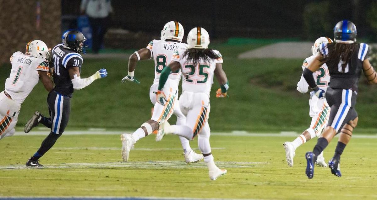 Miami's Corn Elder (29) returns a kickoff, which featured multiple laterals before Elder subsequently received the final lateral, and scores to beat Duke 30-27 in 2015.