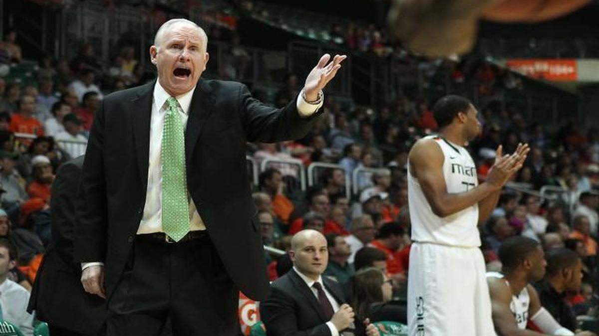 
Miami Hurricanes head coach Jim Larranaga argues a play during the second half of their game against Notre Dame at the BankUnited Center in Coral Gables on Wednesday, February 19, 2014.
