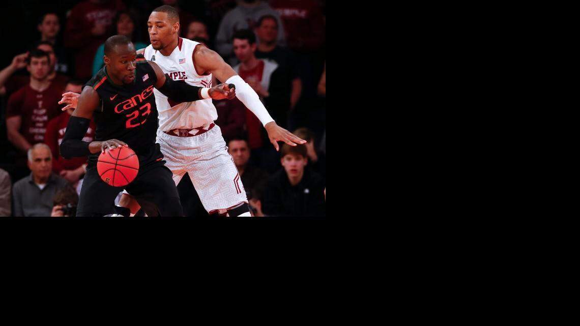 
Devontae Watson #23 of the Temple Owls guards Tonye Jekiri #23 of the Miami Hurricanes during the NIT Championship semifinals at Madison Square Garden on March 31, 2015 in New York City. 
