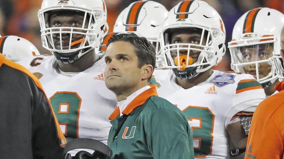 Hurricanes defensive coach Manny Diaz is seen with his players in the first quarter of the 2018 ACC Championship Game.