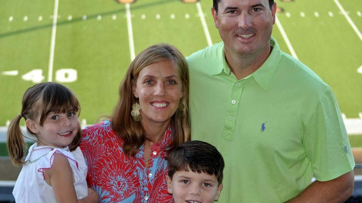 Former Wake Forest assistant coach and radio analyst Tommy Elrod poses with his family at BB&T Field in an undated photo.
