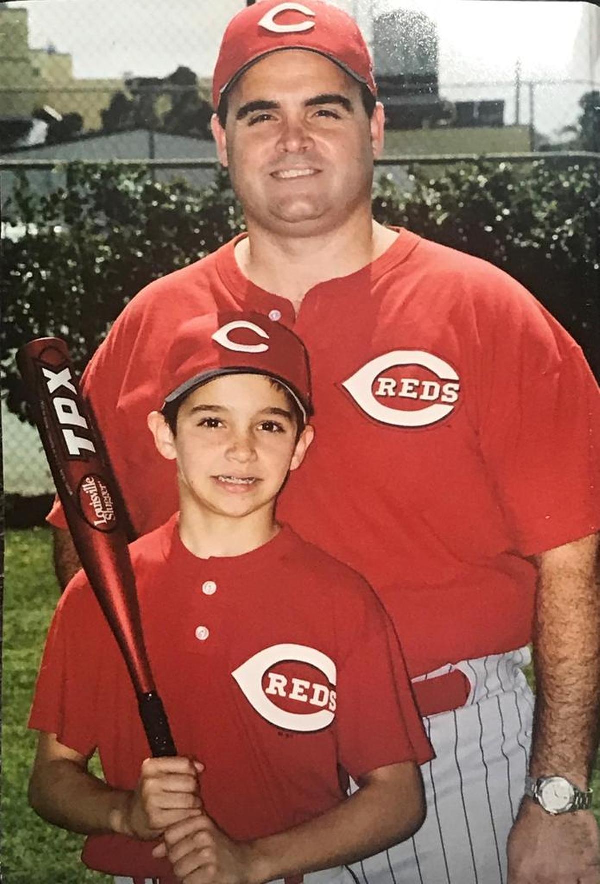 Jake Anchia, now a star catcher at Nova Southeastern University, and his father, Miguel Anchia, now a deputy fire chief in Miami Beach.
