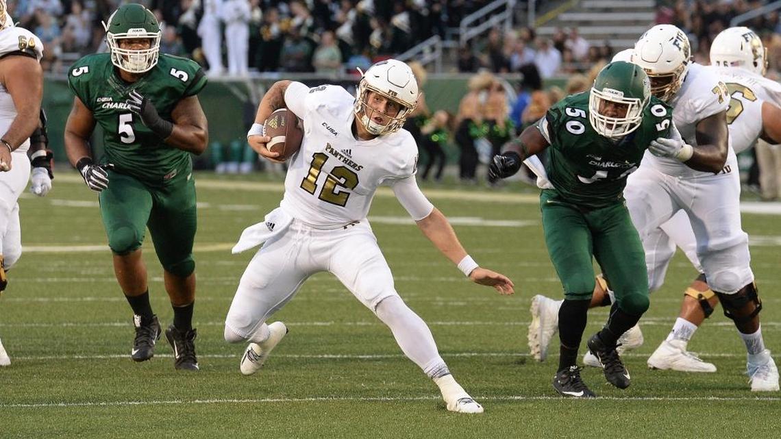FIU quarterback Alex McGough makes a move with the football during Saturday night’s victory in Charlotte.