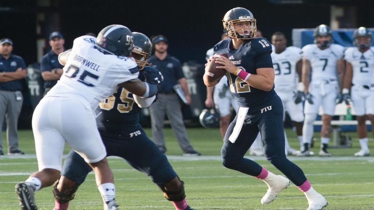 FIU quaterback Alex McGough in action during the first half of a college football game between the Florida International Golden Panthers and Old Dominion University at Ocean Bank Field at FIU Stadium in Miami on Oct. 24, 2015.