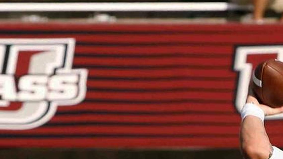 Florida International quarterback Alex McGough throws a pass against Massachusetts during an NCAA college football game Saturday, Sept. 17, 2016, in Amherst, Mass.