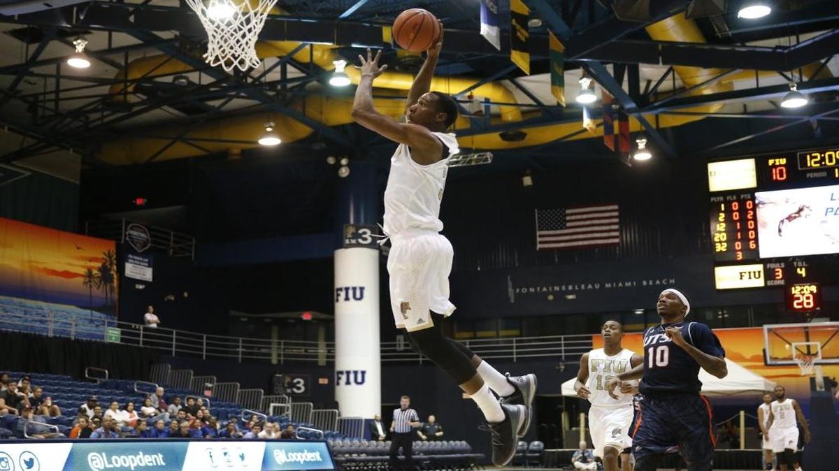 Florida International Golden Panthers forward Daviyon Draper (32) dunks the ball on a fast break as Florida International University hosts UTSA in men's basketball at FIU Arena on Saturday, February 13, 2016.