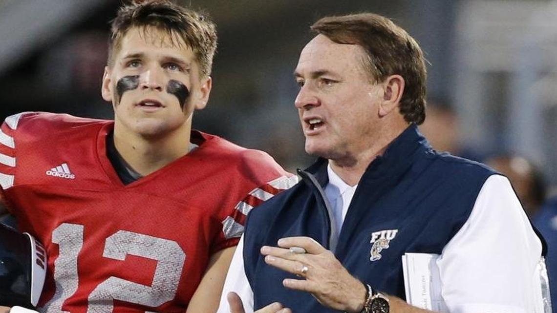 FIU head coach Butch Davis with quarterback Alex McGough (12) during spring football game at FIU Stadium on Friday, April 7, 2017.