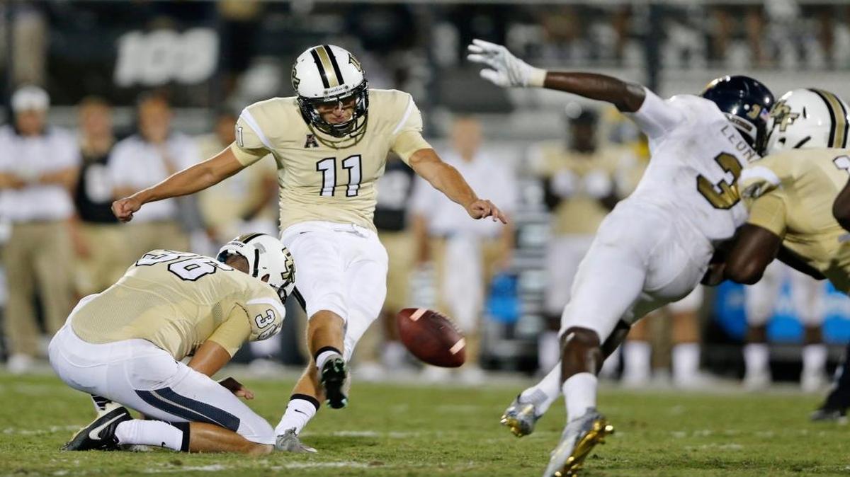 
UCF kicker Matthew Wright misses a late fourth-quarter field-goal attempt against FIU as the Panthers won 15-14 at Bright House Networks Stadium in Orlando on Thursday, Sept. 3, 2015.
