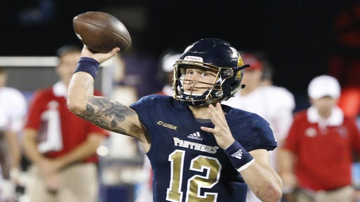 FIU Golden Panthers quarterback Alex McGough (12) passes in the third quarter as Florida International University hosts Florida Atlantic University at Ocean Bank Field on Saturday, October 1, 2016.