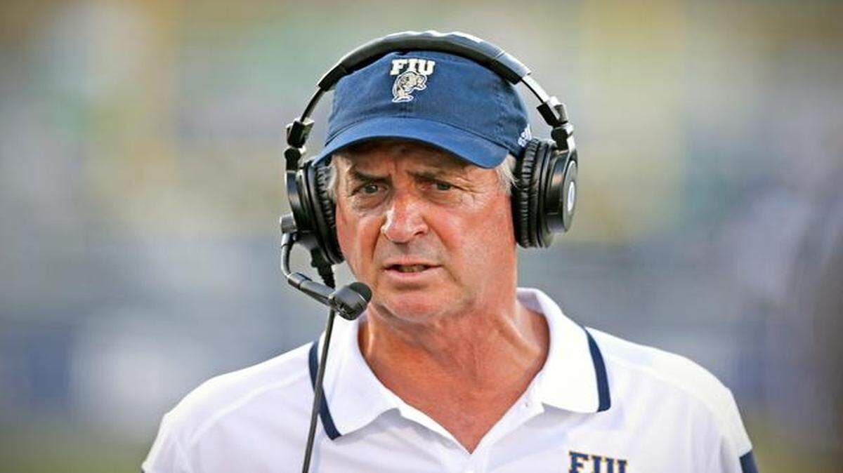 
FIU head coach Ron Turner looks on as the Florida International University Panthers host the Marshall Thundering Herd at Ocean Bank Stadium in Miami on Saturday, Oct. 18, 2014.
