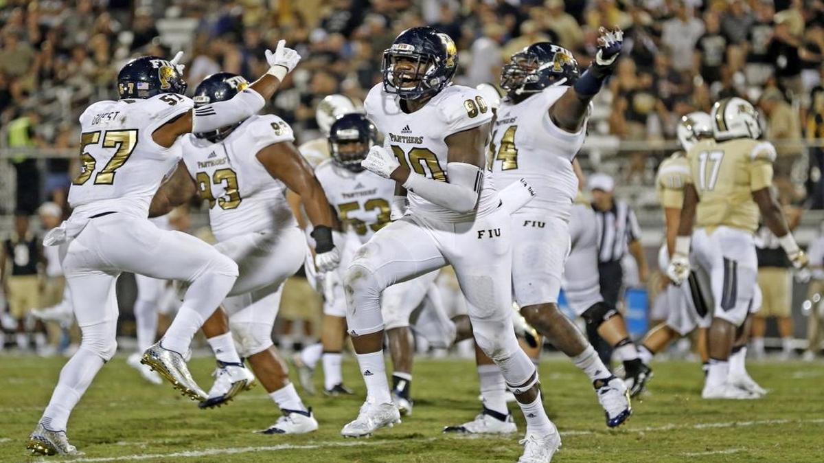 
FIU Panthers tight end Ya'Keem Griner (80) and teammates celebrate after defeating the UCF Knights at Bright House Networks Stadium in Orlando on Thursday, September 3, 2015.
